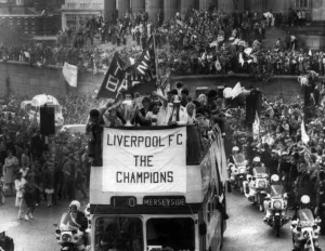 The Liverpool FC Tour Bus passes through Liverpool City Centre as the players enjoy a The Liverpool FC Tour Bus passes through Liverpool City Centre as the players enjoy a