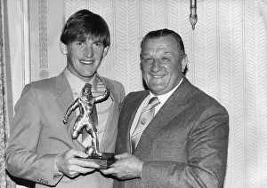 Liverpool footballer Kenny Dalglish recieves an award from manager Bob Paisley Liverpool footballer Kenny Dalglish recieves an award from manager Bob Paisley