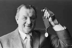 Liverpool manager Bob paisley proudly displays his latest award as " Liverpool manager Bob paisley proudly displays his latest award as "