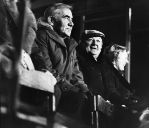 Liverpool manager Bob Paisley, in unfamiliar cap, watches Altrincham in action during Liverpool manager Bob Paisley, in unfamiliar cap, watches Altrincham in action during