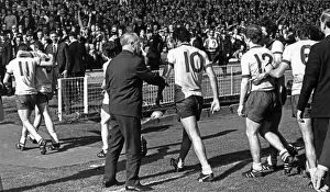 Liverpool manager Bill Shankly goes forward to congratulate the Arsenal players as they Liverpool manager Bill Shankly goes forward to congratulate the Arsenal players as they