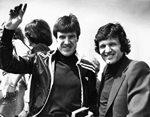 Liverpool player Emlyn Hughes boarding a flight, circa 1973 Liverpool player Emlyn Hughes boarding a flight, circa 1973