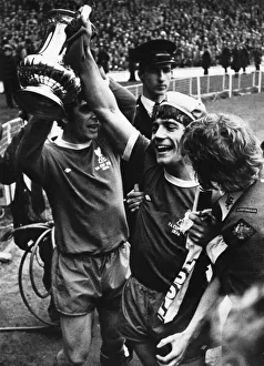 Liverpool players Kevin and Keegan celebrate with the FA Cup trophy following their 3-0 Liverpool players Kevin and Keegan celebrate with the FA Cup trophy following their 3-0