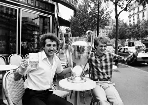 Liverpool players Phil Thompson and Alan Kennedy celebrate with the European Cup after Liverpool players Phil Thompson and Alan Kennedy celebrate with the European Cup after