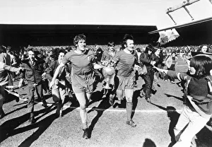 Liverpool players Tommy Smith and Emlyn Hughes parade the league championship trophy Liverpool players Tommy Smith and Emlyn Hughes parade the league championship trophy