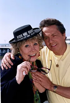 Liz Dawn actress wearing a Kiss Me Quick hat with David Ross Liz Dawn actress wearing a Kiss Me Quick hat with David Ross