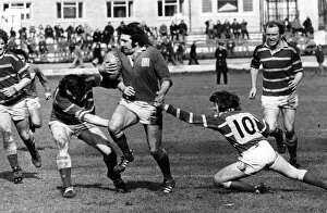 Images Dated 24th March 1975: Llaneli forward Tommy David looks quite capable of taking on half the Bridgend team in