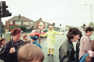 Lollipop lady Janet Taylor on duty at the junction of Trunk Road with King's Road Lollipop lady Janet Taylor on duty at the junction of Trunk Road with King's Road