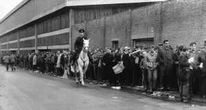 Long line of Liverpool fans queue up for tickets outside Anfield stadium Long line of Liverpool fans queue up for tickets outside Anfield stadium