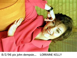 Lorraine Kelly TV Presenter wearing pink jacket and black strap watch A©mirrorpix Lorraine Kelly TV Presenter wearing pink jacket and black strap watch A©mirrorpix