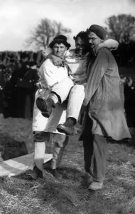 The loser, Ben Hopkins carried away after the contest. His right leg bound with blood The loser, Ben Hopkins carried away after the contest. His right leg bound with blood