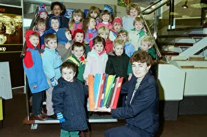 Images Dated 4th February 1991: Luke Walker, from Marsden Nursery School, is seen with classmates who visited W H Smith