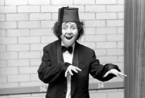 Lulu impersonating Tommy Cooper. January 1975 Lulu impersonating Tommy Cooper. January 1975