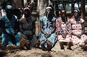 Luo women smoking traditional pipes Nyanza Province South West Kenya Africa Luo women smoking traditional pipes Nyanza Province South West Kenya Africa