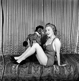 Lynne Breton. Woman with stuffed toy donkey. October 1952 C4870 Lynne Breton. Woman with stuffed toy donkey. October 1952 C4870