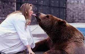 Maggie Robin feeding Hercules the Bear orally May 1989 Maggie Robin feeding Hercules the Bear orally May 1989
