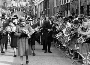 Her Majesty the Queen and HRH The Duke of Edinburgh make their way down Dunraven Street Her Majesty the Queen and HRH The Duke of Edinburgh make their way down Dunraven Street