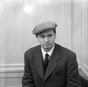 Man Wearing a suit and cap. October 1952 C4935 Man Wearing a suit and cap. October 1952 C4935