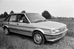 A man and woman in a MG Maestro. 8th June 1983 A man and woman in a MG Maestro. 8th June 1983