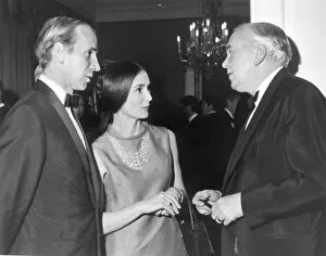 Images Dated 5th March 1970: Manchester United footballer Bobby Charlton with his wife Norma talking to Prime Minister