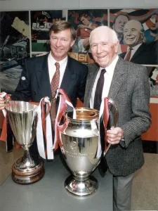 Manchester United manager Alex Ferguson and former manager Sir Matt Busby posing with Manchester United manager Alex Ferguson and former manager Sir Matt Busby posing with