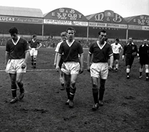 Manchester United players Colin Webster and Bobby Charlton pictured leaving the field Manchester United players Colin Webster and Bobby Charlton pictured leaving the field