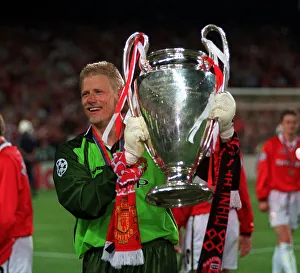 Manchester United's Peter Schmeichel May 1999 holds the European Cup as Manchester United's Peter Schmeichel May 1999 holds the European Cup as