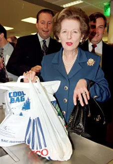 Margaret Thatcher former Conservative Prime Minister holding a Tesco plastic carrier bag Margaret Thatcher former Conservative Prime Minister holding a Tesco plastic carrier bag