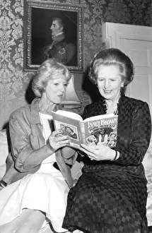 Margaret Thatcher and Janet Brown at 10 Downing Street reading Janet Brown' Margaret Thatcher and Janet Brown at 10 Downing Street reading Janet Brown'
