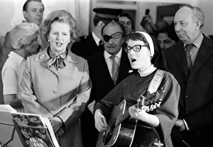 Images Dated 11th July 1980: Margaret Thatcher July 1980 visits Toynbee Hall in the East End singing with a nun