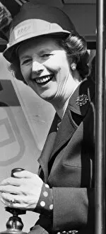 Images Dated 19th April 1984: Margaret Thatcher laughing sitting in JCB digger in Docklands - April 1984