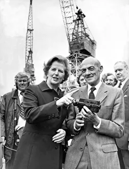 Margaret Thatcher presents Danny Brown with his retirement gift Margaret Thatcher presents Danny Brown with his retirement gift