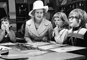 Margaret Thatcher sits with children taking a reading class at the Northern Councties Margaret Thatcher sits with children taking a reading class at the Northern Councties