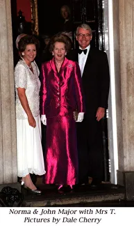 Margaret Thatcher wearing a long pink dress stands with Prime Minister John Major Margaret Thatcher wearing a long pink dress stands with Prime Minister John Major