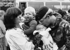 Marine Andrew Riley delighted to see his baby son Darren 4 weeks old born while Andrew Marine Andrew Riley delighted to see his baby son Darren 4 weeks old born while Andrew