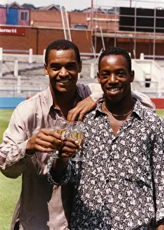Mark Bright and Ian Wright footballers toast each other with a glass of champagne Mark Bright and Ian Wright footballers toast each other with a glass of champagne