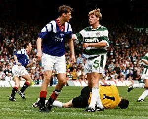 Mark McNally argues with Duncan Ferguson as goalkeeper Pat Bonner lies injured football Mark McNally argues with Duncan Ferguson as goalkeeper Pat Bonner lies injured football