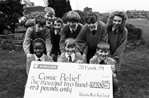 Masters of the roles... Salendine Nook High School pupils with a huge cheque for the huge Masters of the roles... Salendine Nook High School pupils with a huge cheque for the huge