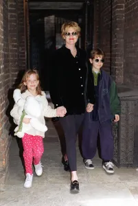 Melanie Griffith Actress leaving her flat in mayfair with children Dakota and Alexander Melanie Griffith Actress leaving her flat in mayfair with children Dakota and Alexander