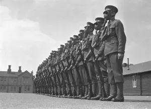 Members of the local regiment seen here on parade wearing gas maks Members of the local regiment seen here on parade wearing gas maks