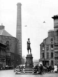 Men gathered around Robert Burns monument where Constitution and Bernard Street meet Men gathered around Robert Burns monument where Constitution and Bernard Street meet