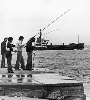 These four men have obviously fallen hook line and sinker for the angling bug These four men have obviously fallen hook line and sinker for the angling bug