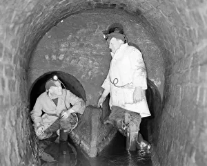 Two of the men who know the secrets of the dark world that lies under the busy streets of Two of the men who know the secrets of the dark world that lies under the busy streets of