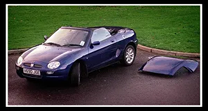 MG MGF December 1999 Dark blue paintwork alloy wheels hard top removed MG MGF December 1999 Dark blue paintwork alloy wheels hard top removed