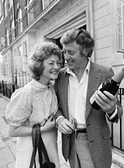 Michael Aspel and his wife Lizzie Power leaving a Harley Street Clinic. 5th June 1982 Michael Aspel and his wife Lizzie Power leaving a Harley Street Clinic. 5th June 1982