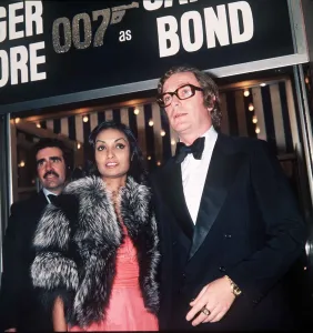 Michael Caine Actor with his wife Shakira - December 1974 At the premiere of Michael Caine Actor with his wife Shakira - December 1974 At the premiere of