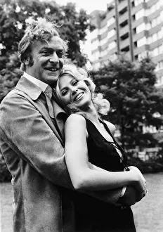 Michael Caine and Britt Ekland pose for photographers during a break in filming Get Michael Caine and Britt Ekland pose for photographers during a break in filming Get