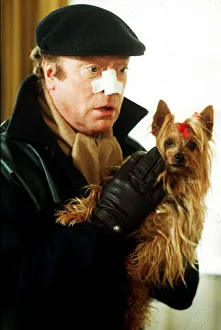 Michael Caine Film Actor in the new film Bullseye with his dog Ocotber 1989 Michael Caine Film Actor in the new film Bullseye with his dog Ocotber 1989