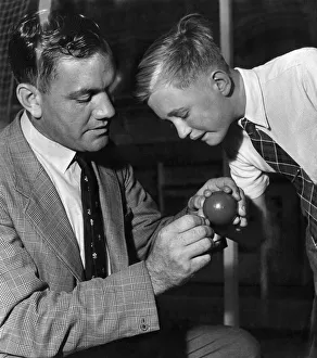 Michael Gadsby a young cricketer having instruction on bowling from Alec Bedser at Michael Gadsby a young cricketer having instruction on bowling from Alec Bedser at