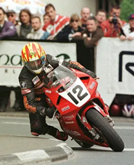 Michael Rutter Racing Driver June 1998 rounding the quater bridge Michael Rutter Racing Driver June 1998 rounding the quater bridge